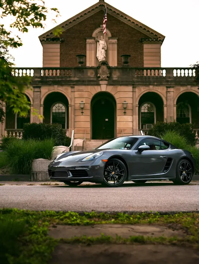 Luxury car parked outside a hotel