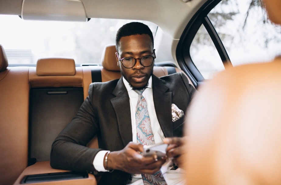 Happy couple in a luxury car